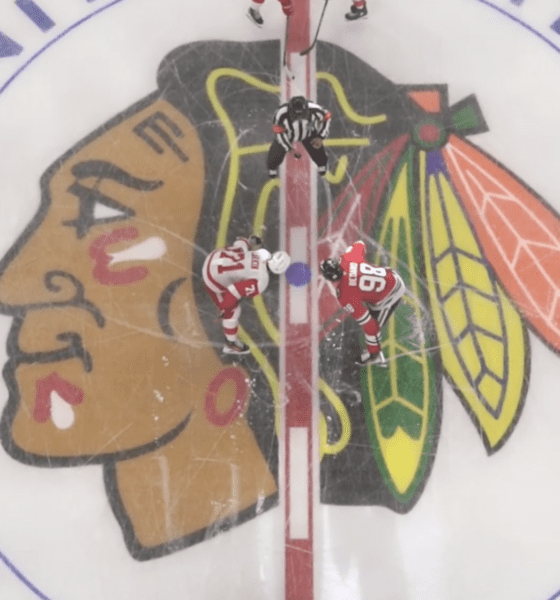 Chicago Blackhawks forward Connor Bedard and Dylan Larkin of the Detroit Red Wings get ready for the faceoff to start the preseason game on Sept. 25.