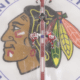 Chicago Blackhawks forward Connor Bedard and Dylan Larkin of the Detroit Red Wings get ready for the faceoff to start the preseason game on Sept. 25.