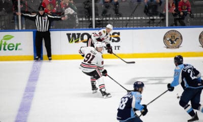 Frank Nazar #91 skates into the offensive zone with the puck against the Admirals on Oct. 18.