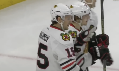 Chicago Blackhawks #15, Artom Anisimov celebrates with his teammates after scoring a goal for Chicago against the Ottawa Senators on Dec. 3, 2015.
