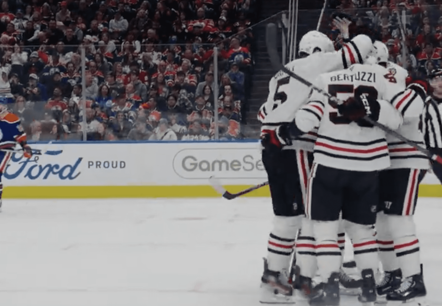 Philipp Kurashev #23 of the Chicago Blackhawks scores the team's first goal of the game against the Edmonton Oilers on Oct. 12, 2024.